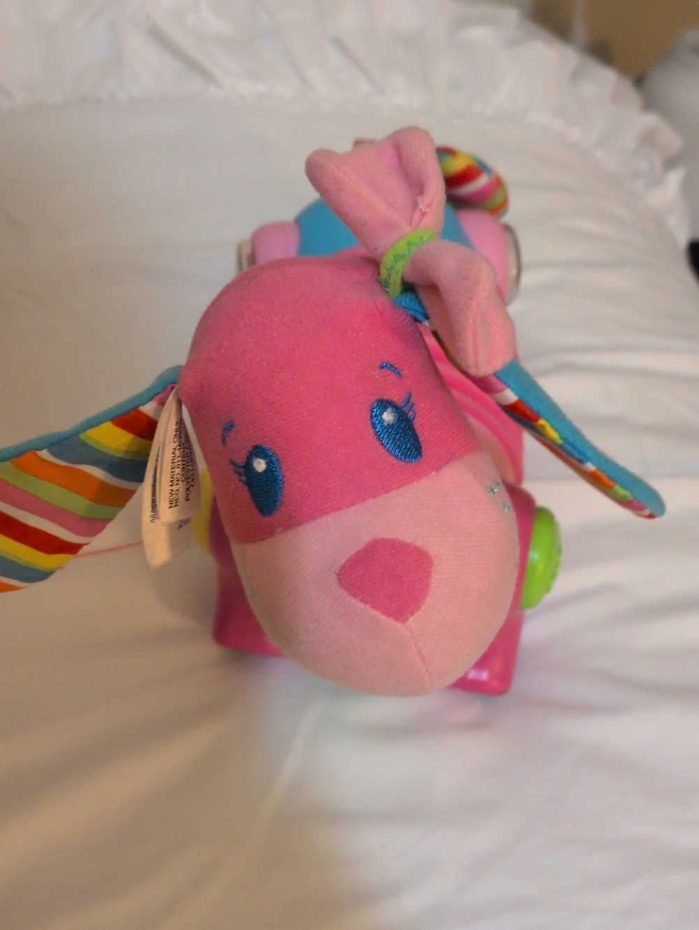 Plush Pink Pull-Along Puppy with Colorful Striped Ears